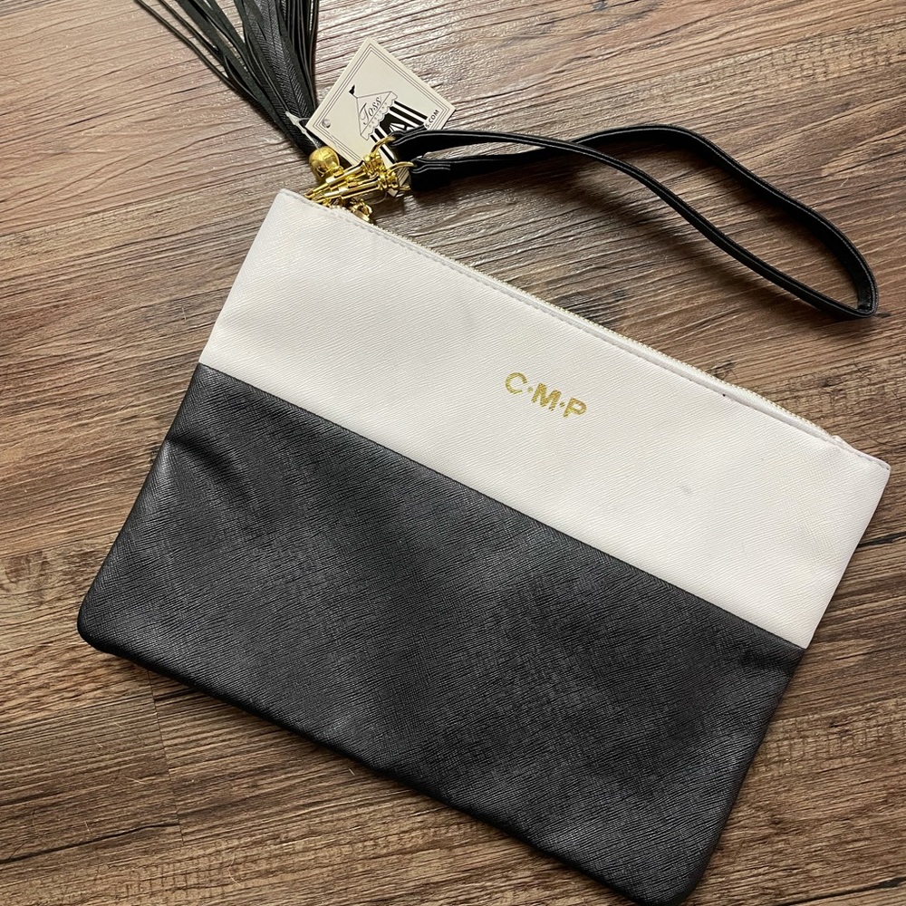 NWT Black and White Clutch with Tassel!